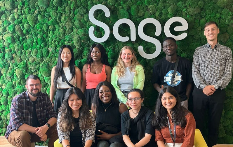 Sage apprentices in  a group in the office
