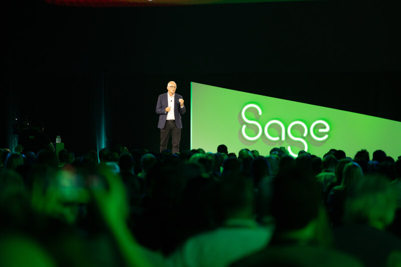Sage CEO Steve Hare on stage talking at Sage Future