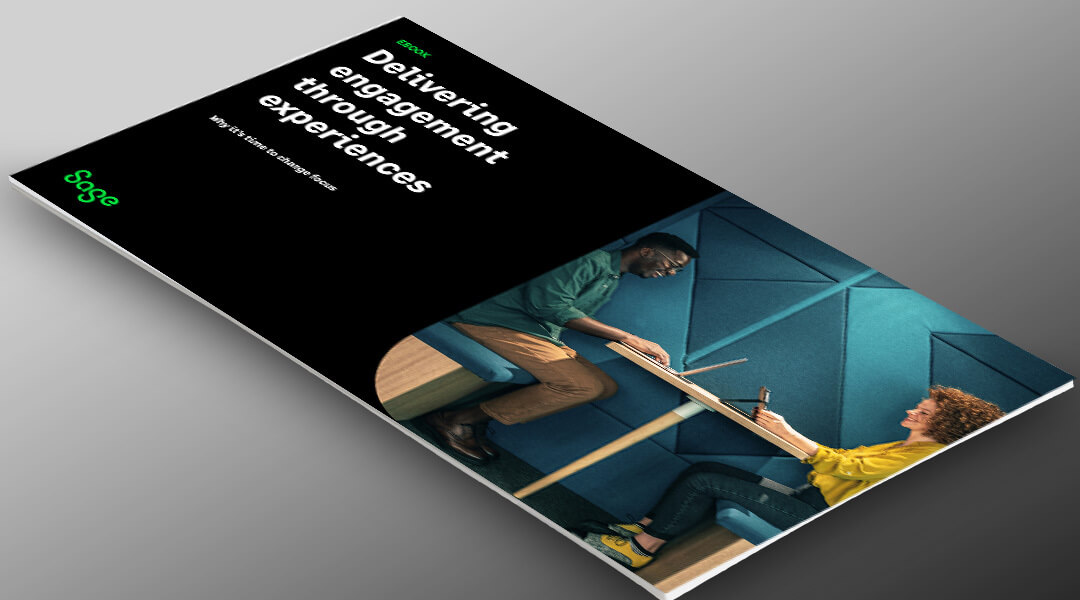 Delivering engagement through experiences ebook cover photo of 3 colleagues chatting in office atrium